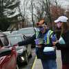 Cromwell distributed at-home COVID tests and masks outside of Town Hall on Wednesday, Jan. 5, 2022. Volunteers, emergency management and health department staff and Mayor Allan Spotts helped with the hand-out.