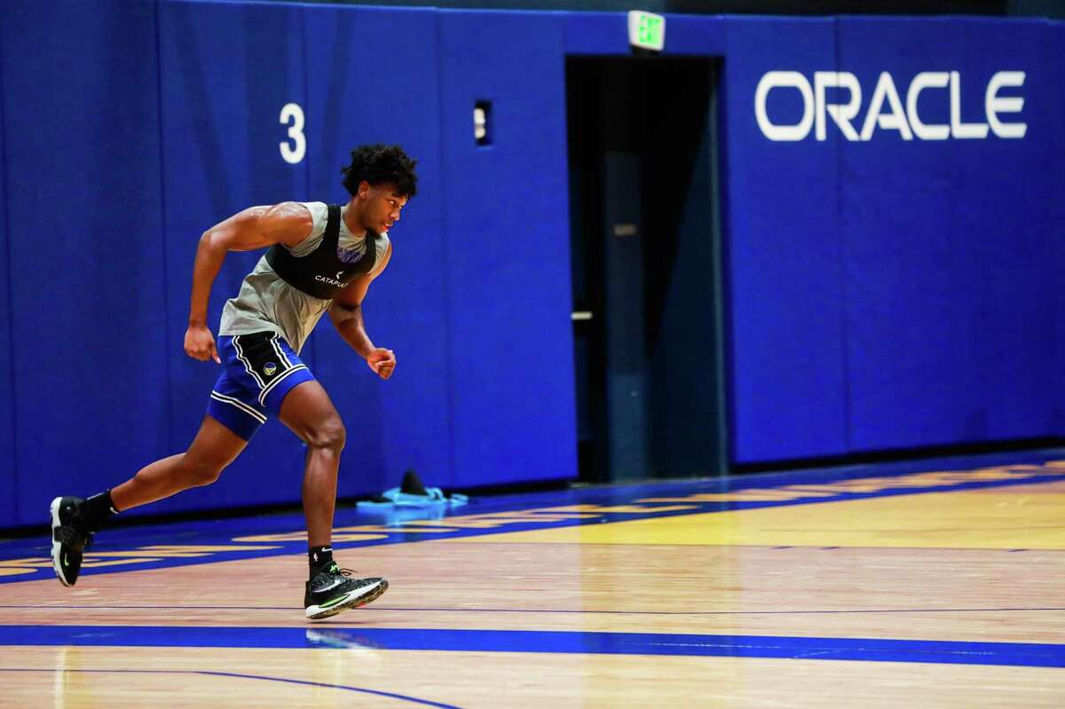 Golden State Warriors player James Wiseman works out during the Warriors shoot around at Chase Center on Tuesday, Dec. 7, 2021 in San Francisco, California.