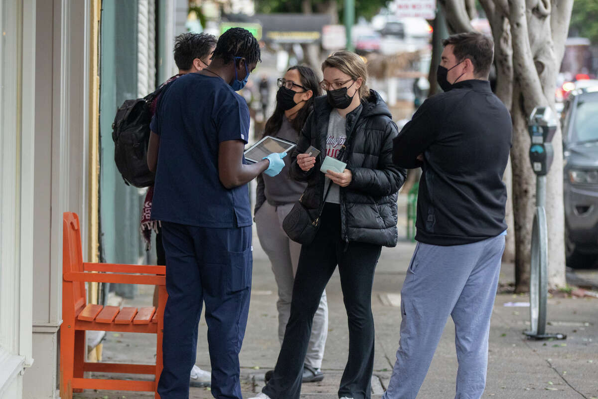 People line up to receive a Covid test on Union Street in San Francisco, Calif. on Jan. 4, 2022.