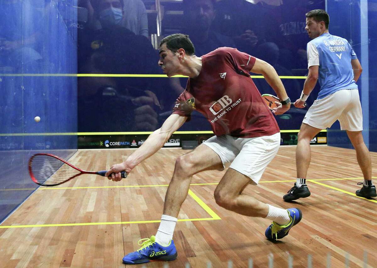 2020/2021 World Champion squash player Ali Farag of Egypt, left, takes on Raphael Kandra of Germany in day 2 of the Houston Open, a Professional Squash Association tournament, at the Houston Squash Club on Wednesday, Jan. 5, 2022. The tournament has a $110k purse, one of the largest prize money tournaments in the U.S.
