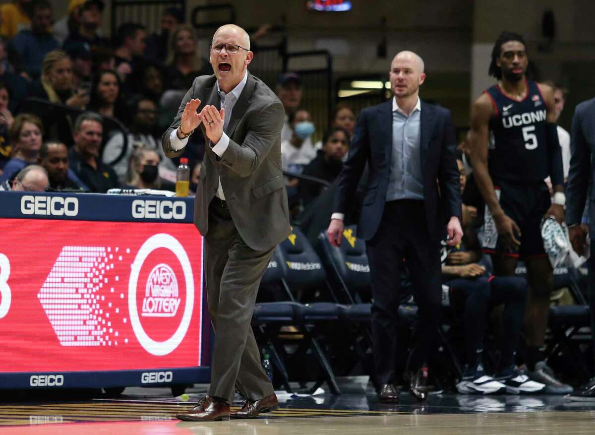 Connecticut coach Dan Hurley reacts during the second half of the team's NCAA college basketball game against West Virginia in Morgantown, W.Va., Wednesday, Dec. 8, 2021. (AP Photo/Kathleen Batten)