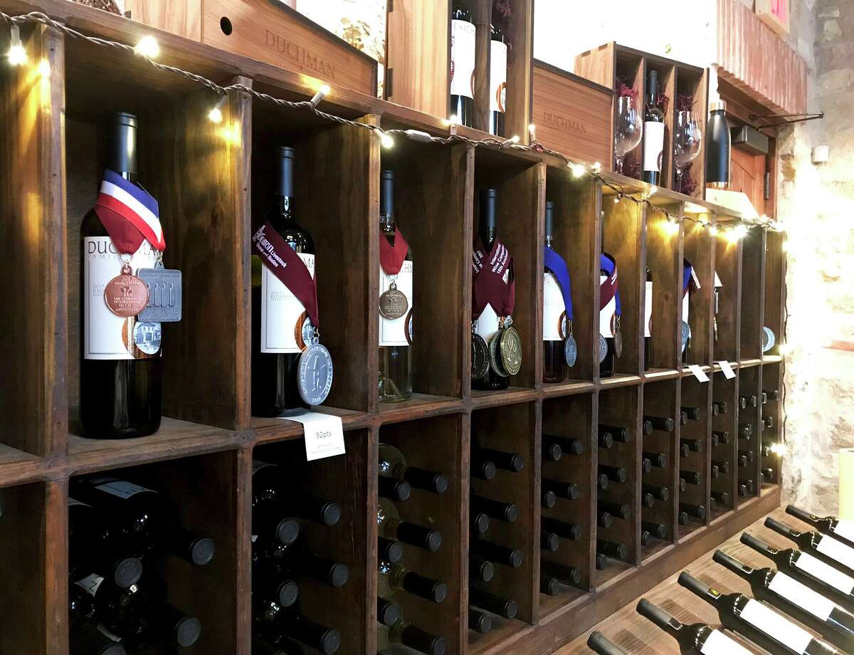 Wines and medals displayed at Duchman Family Winery