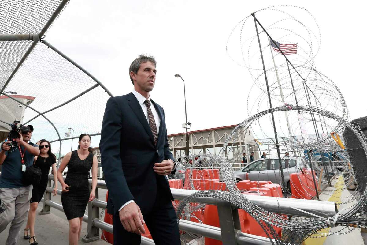 Beto O'Rourke walks on an international bridge to cross into Ciudad Juarez, Mexico, Thursday, Aug. 8, 2019, during his run for the Democratic presidential nomination.