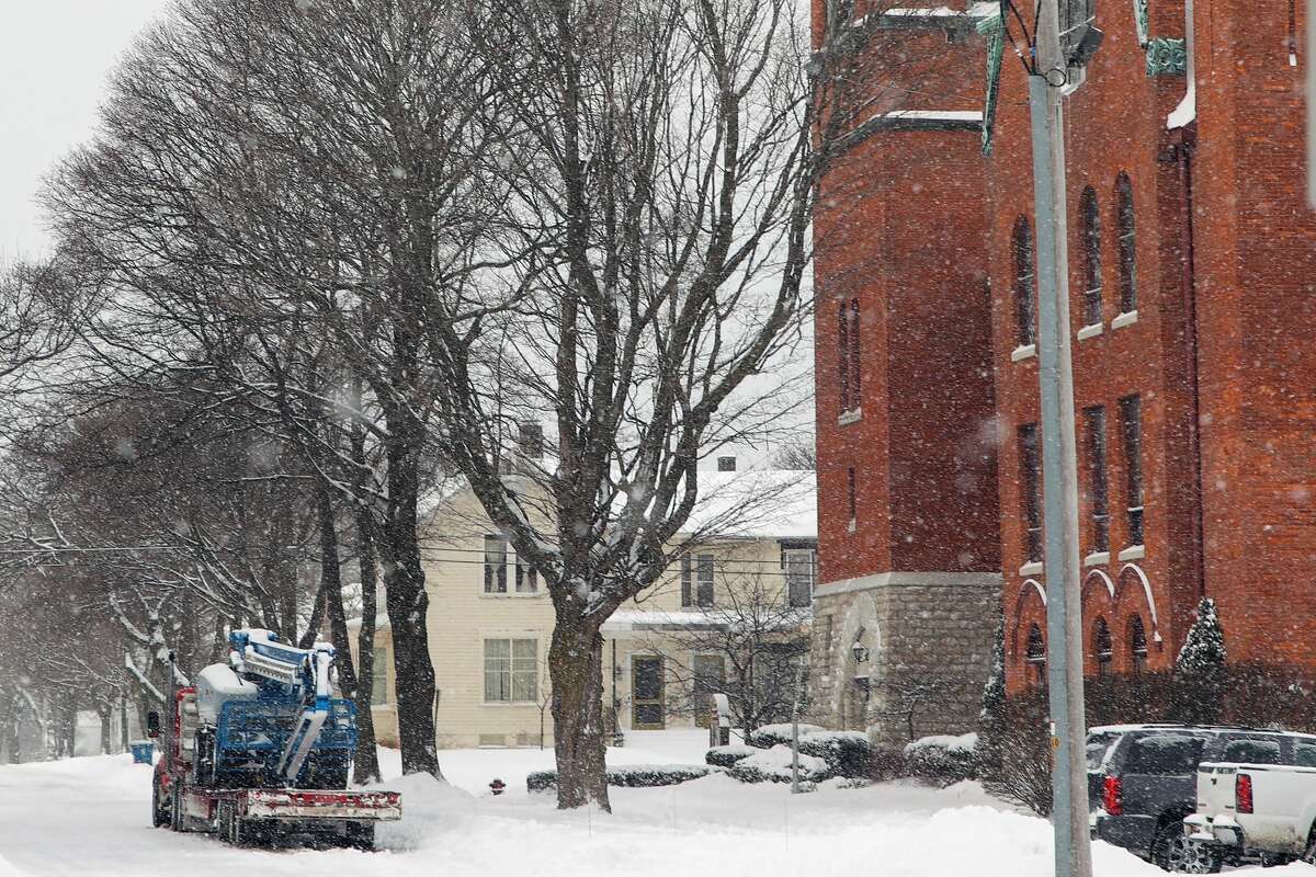 A deparment of public works truck sits across from the First Congregational Church on Fourth Street on Thursday.
