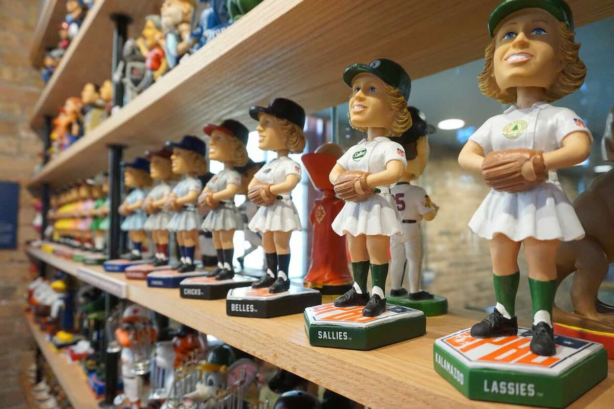 Bobbleheads of ballplayers from the professional women's league on display at the National Bobblehead Hall of Fame and Museum.