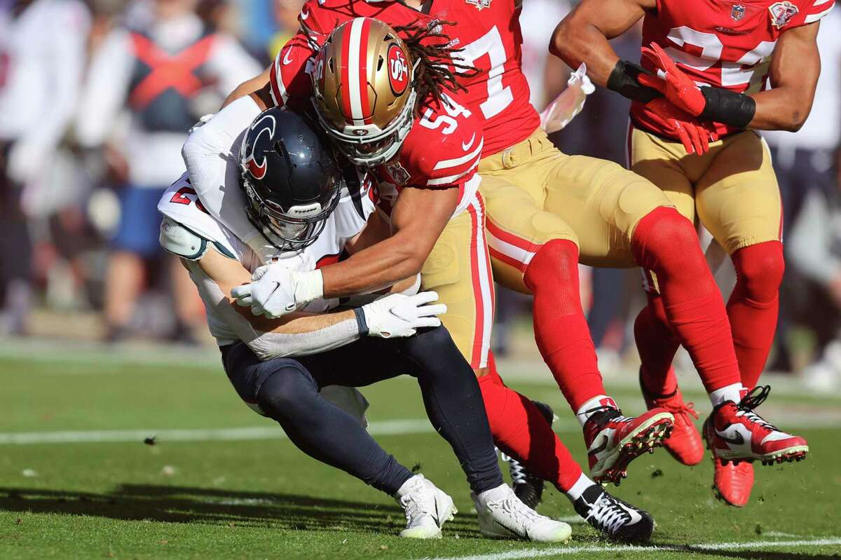 San Francisco 49ers linebacker Fred Warner wears cleats in honor