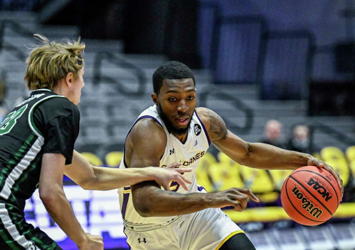 UAlbany guard Jamel Horton drives against Binghamton on Thursday. Horton said the team will need to improve its attention to detail as it travels to New Hampshire.