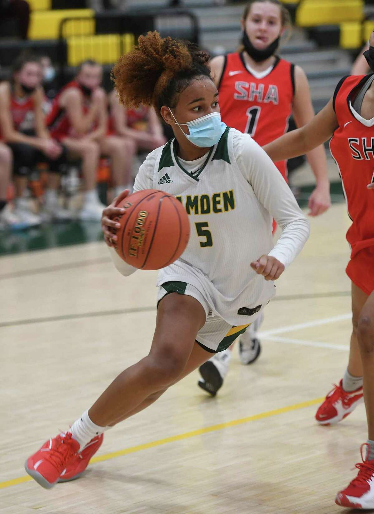 Hamden's Alana Philpotts drives to the basket during the girls' basketball game against Sacred Heart Academy at Hamden High School in Hamden, Connecticut, Thursday, Jan. 6, 2021.