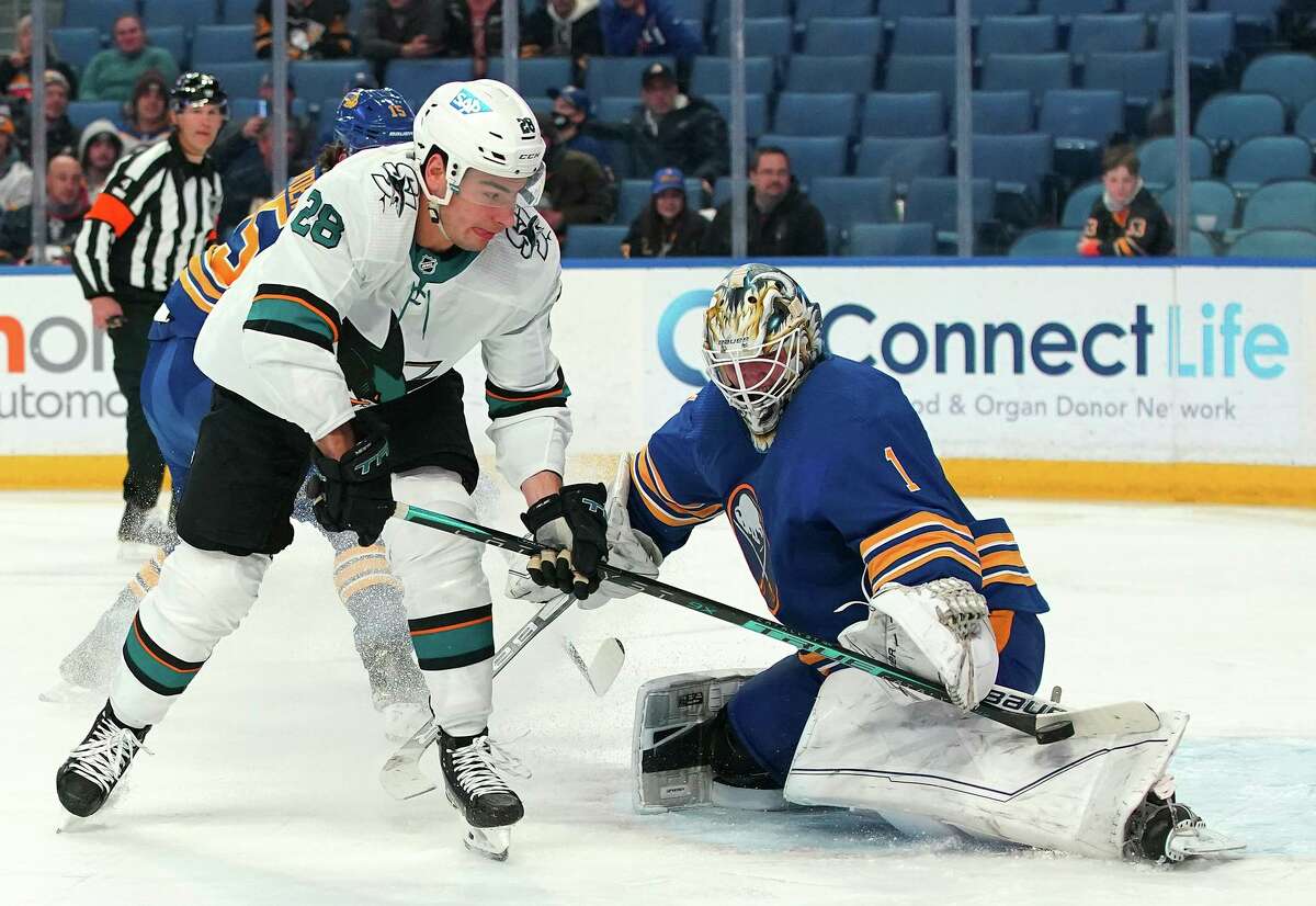 Ukko-Pekka Luukkonen of the Sabres makes the save against Timo Meier of the Sharks during the third period in Buffalo.
