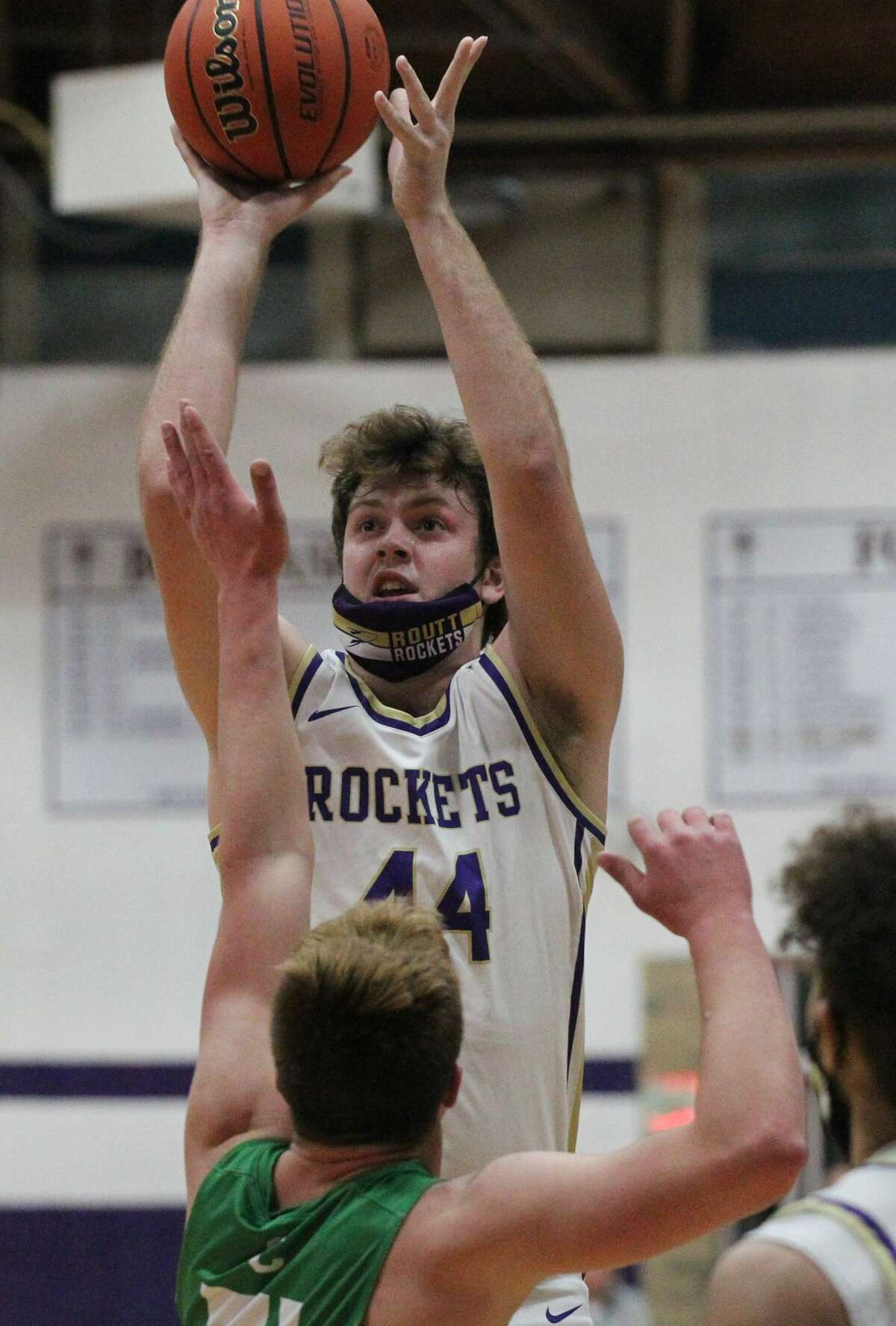 Routt's Gus Abell puts up a shot during a boys' basketball game against Carrollton at the Routt Dome in Jacksonville Thursday night.