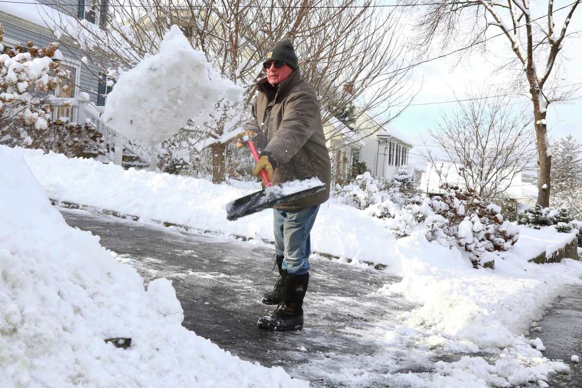 Gary Jacobson shovels his driveway along Old Saugatuck Road in Norwalk on Jan. 7, 2022.