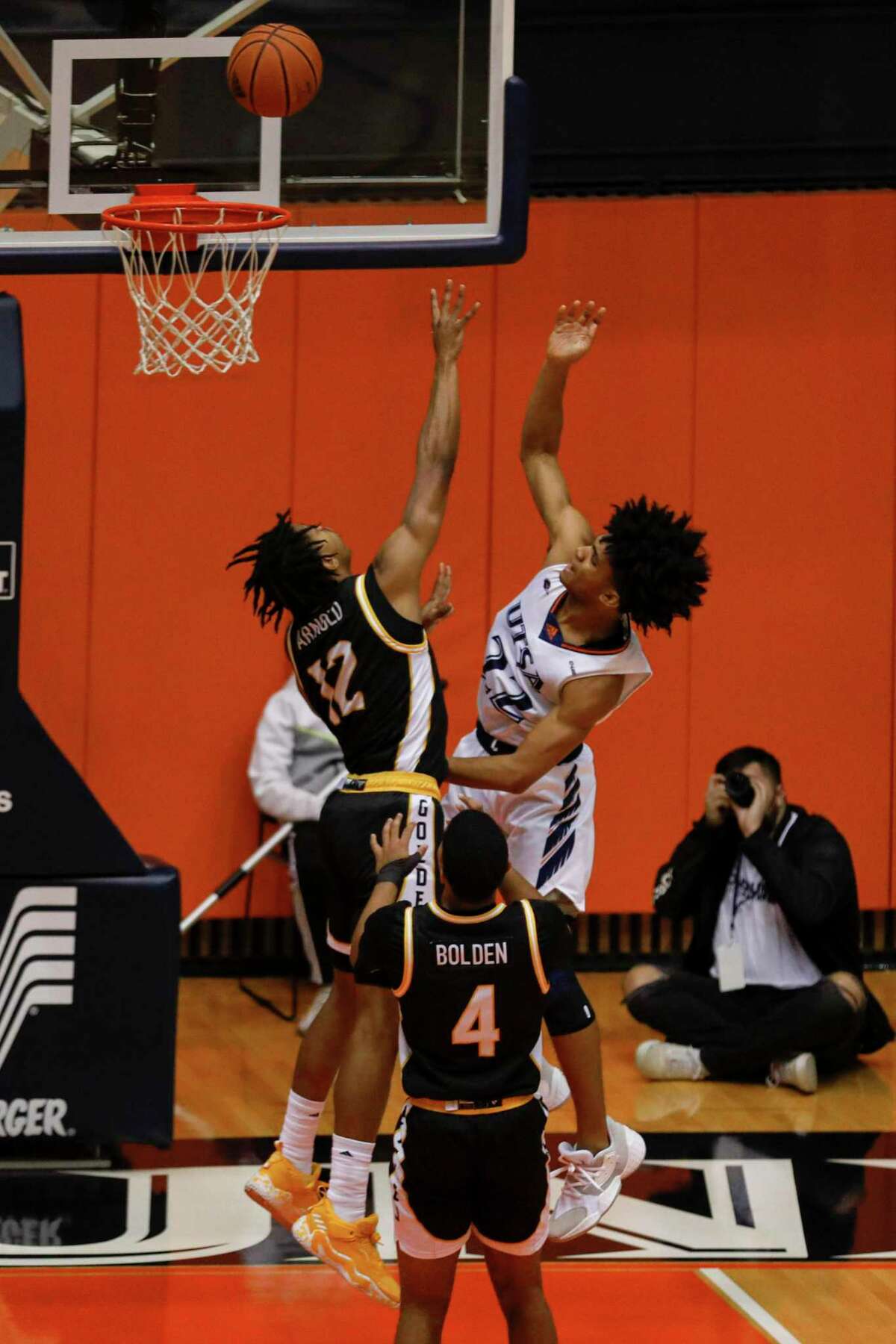 UTSA Roadrunners guard Christian Tucker (22) shoots over Southern Miss Golden Eagles guard Mo Arnold (12) during the first half of a Conference USA game at the Convocation Center in San Antonio, Texas, Thursday, Jan. 6, 2022. The Roadrunners fell 74-73 to the Golden Eagles.