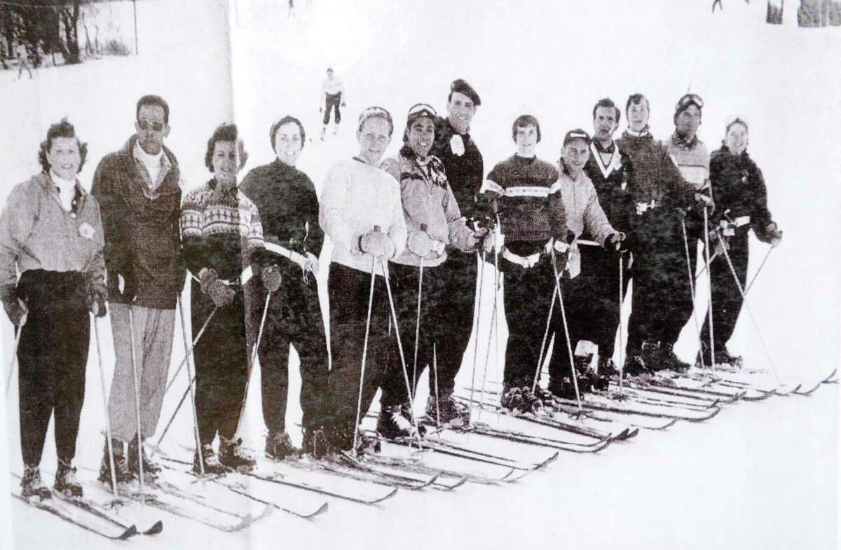This photograph taken in the 1950s shows some of the first members of the Danbury Ski Club.