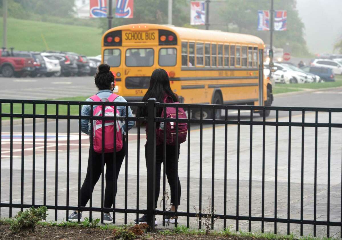 Students wait for the first day of the new school year at Danbury High School to begin. Monday, August 30, 2021, Danbury, Conn.