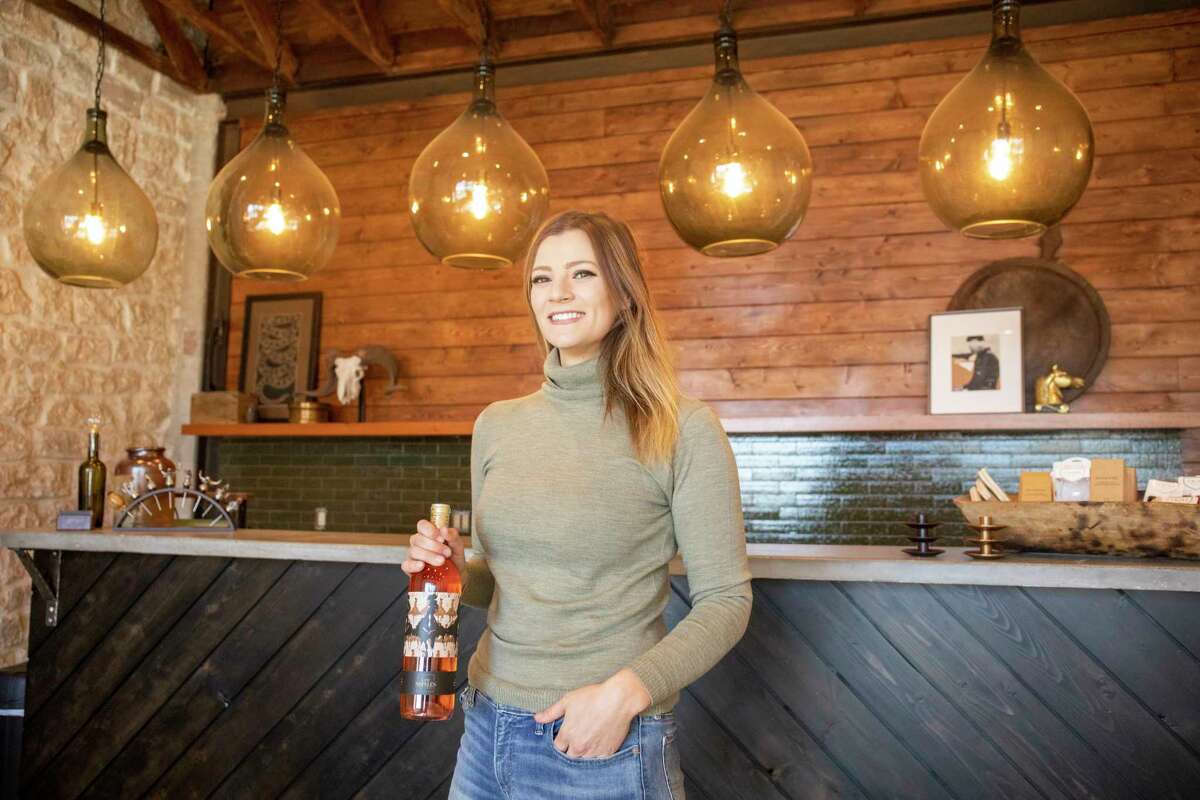Kayln Hodges, owner of Los Nopales Vineyards, poses for a portrait in the tasting room as seen Friday, Jan. 9, 2022, at 620 4th St. in Sterling City. Jacy Lewis/Reporter-Telegram