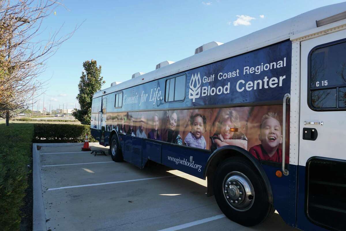 A donor coach from Gulf Coast Regional Blood Center welcomes donors at a blood drive on Wednesday, Jan. 5, at Children’s Lighthouse Harvest Green in Richmond.