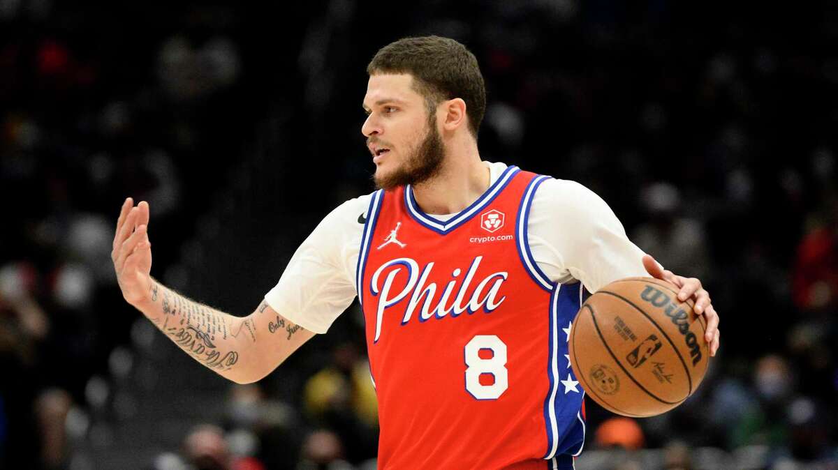 Philadelphia 76ers guard Tyler Johnson (8) in action during the second half of an NBA basketball game against the Washington Wizards, Sunday, Dec. 26, 2021, in Washington. The 76ers won 117-96. (AP Photo/Nick Wass)