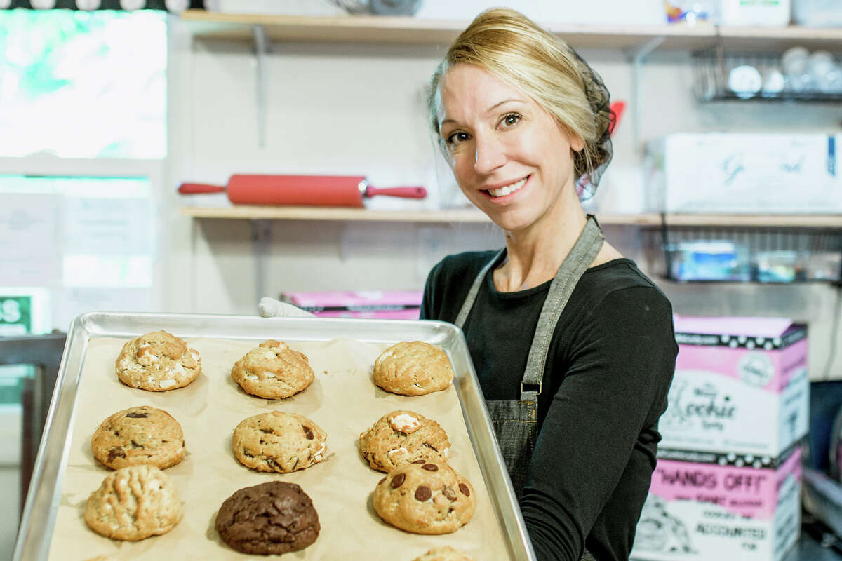 The Maui Cookie Lady owner Mitzi Toro with a tray of her famed cookies. 