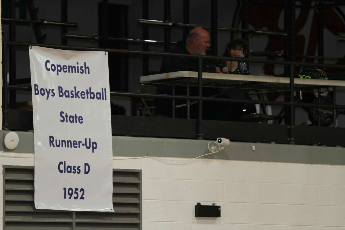 The Copemish Cyclones 1952 season forever hangs in the rafters at Benzie Central after the Huskies honored them on Jan. 7. 