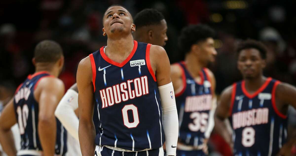 Houston Rockets guard Jalen Green (0) reacts after taking a fall during the third quarter of an NBA game Friday, Jan. 7, 2022, at the Toyota Center in Houston.