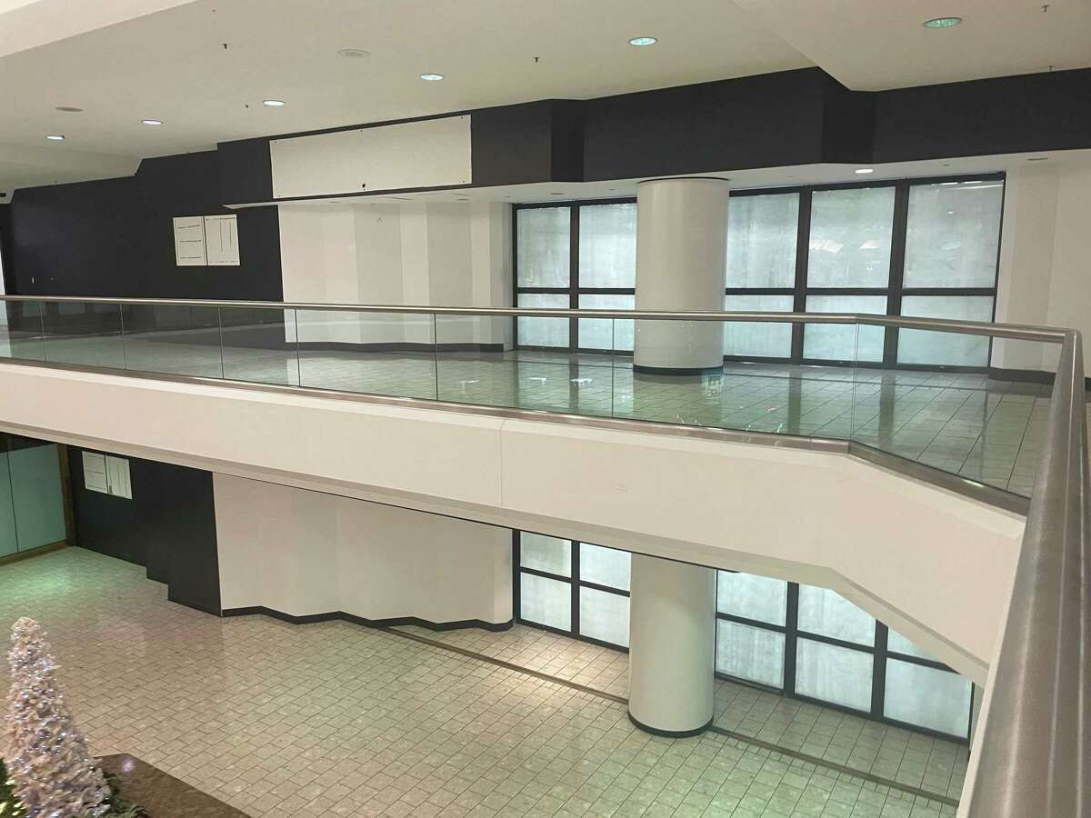 A view of the front entrance to the former Saks Off 5th department store at Stamford Town Center mall in Stamford, Conn. The store closed on Dec. 18, 2021.