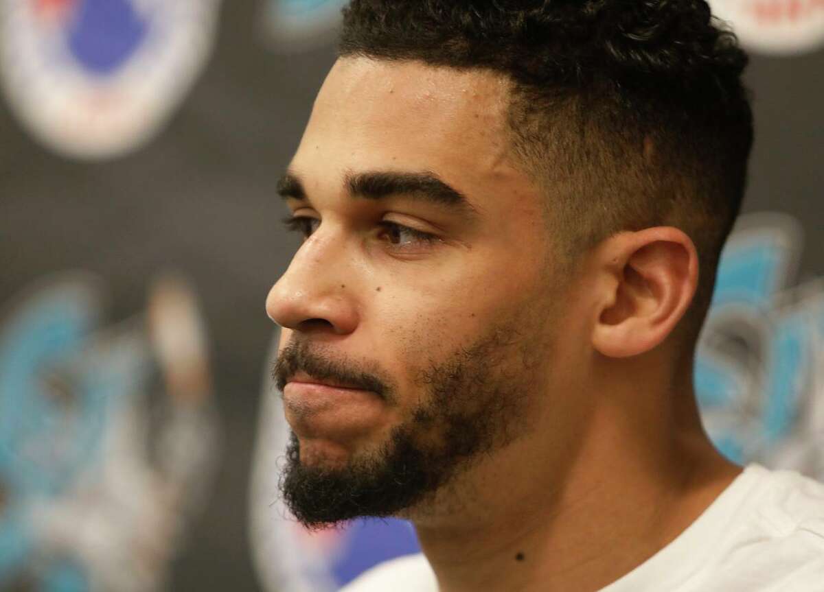 Evander Kane answers questions from the media after practice with the AHL’s Barracuda in San Jose in November. The Sharks placed the forward on waivers and announced they were seeking to terminate his contract.