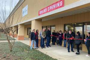 Michael and Vilma Conner cut the ribbon on the new thrift store, Re:stored, which will help fund their rehabilitation non-profit, The Dream Center of Southeast Texas.
