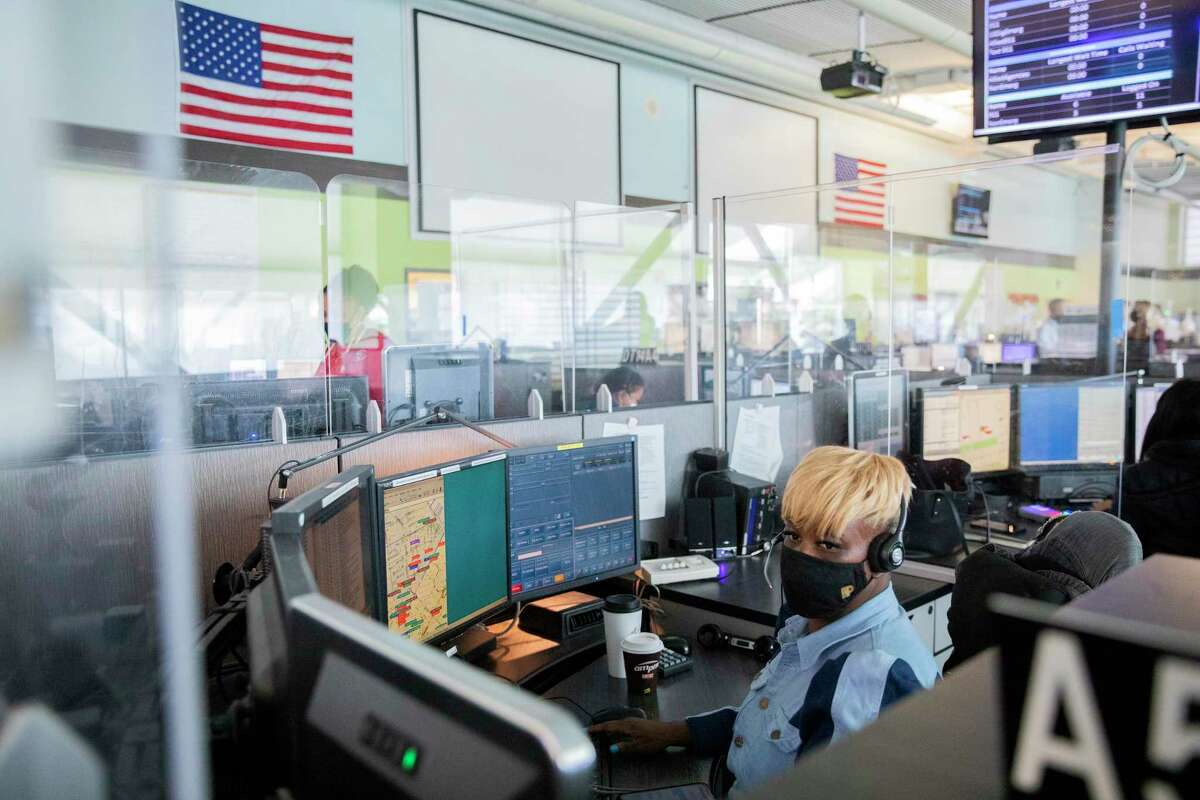 Dawn Shaw works as a dispatcher at the 911 emergency call center on Turk Street in San Francisco, shown here on Nov. 30, 2021.