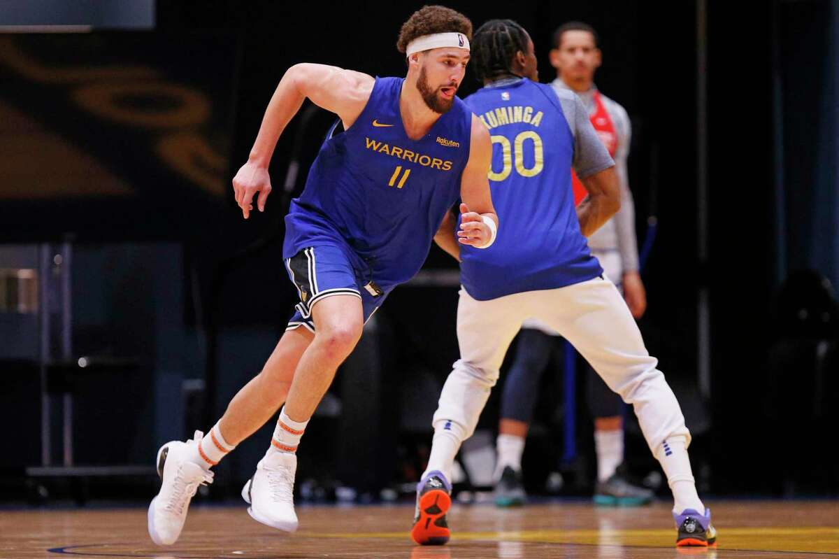 Warriors guard Klay Thompson practices with teammates at Chase Center on Saturday. Thompson hasn’t appeared in an NBA game since the 2019 NBA Finals.