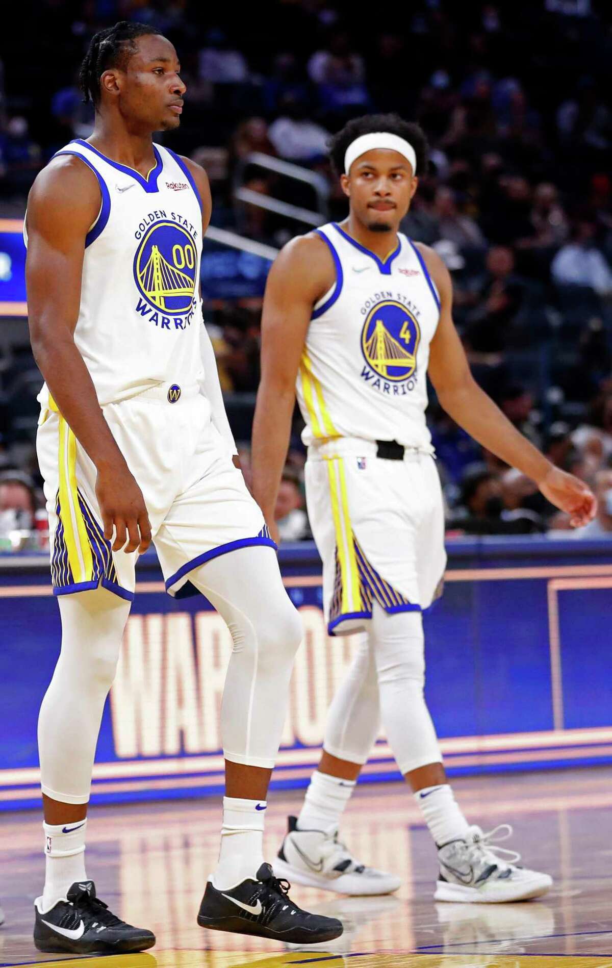 Golden State Warriors' Jonathan Kuminga and Moses Moody in 3rd quarter of Warriors' 118-116 win over Denver Nuggets during NBA preseason game at Chase Center in San Francisco, Calif., on Wednesday, October 6, 2021.