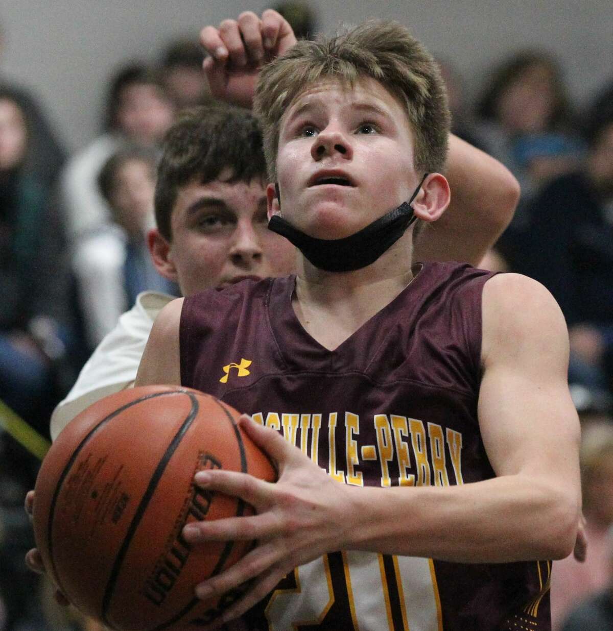 Action from the West Central boys' basketball team's win over Griggsville-Perry in the first round of the Winchester Invitational Tournament on Saturday