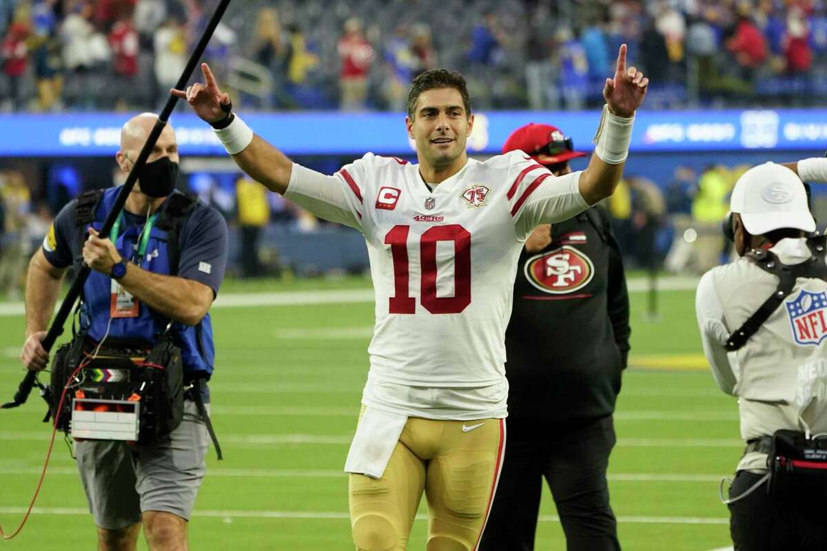 San Francisco 49ers quarterback Jimmy Garoppolo (10) leaves the field after a 27-24 win over the Los Angeles Rams in an NFL football game Sunday, Jan. 9, 2022, in Inglewood, Calif. (AP Photo/Marcio Jose Sanchez)