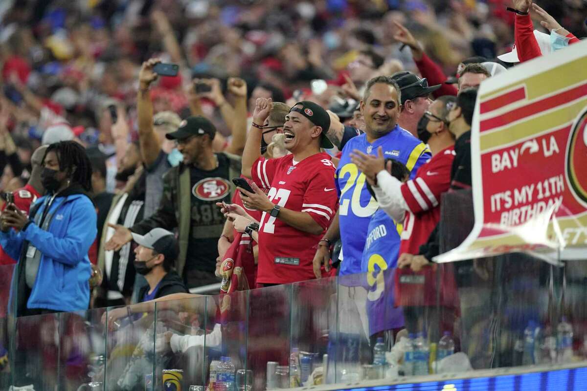 San Francisco 49ers fans cheer after cornerback Ambry Thomas caught an interception in overtime of an NFL football game against the Los Angeles Rams Sunday, Jan. 9, 2022, in Inglewood, Calif. (AP Photo/Mark J. Terrill)