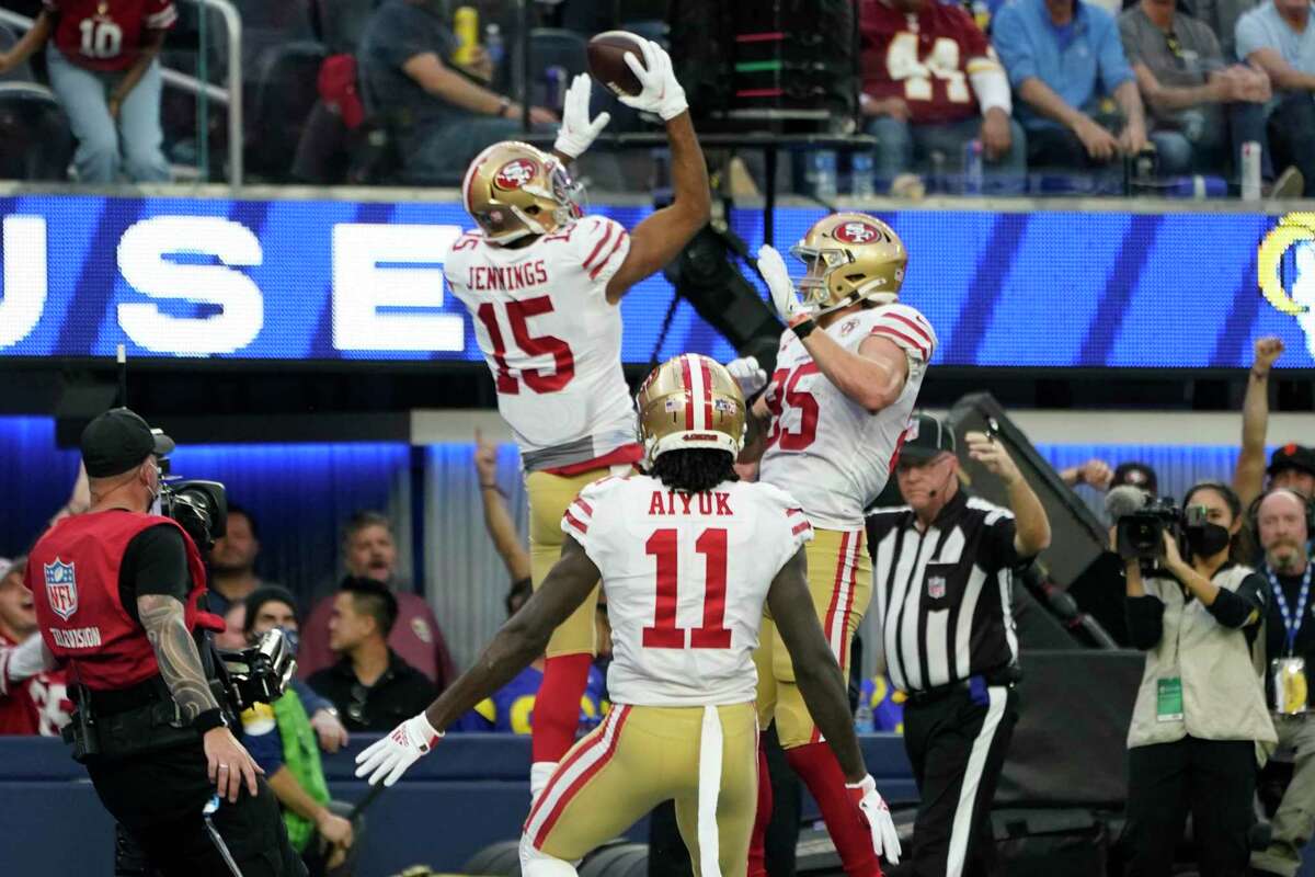 Jauan Jennings of the San Francisco 49ers runs the ball during