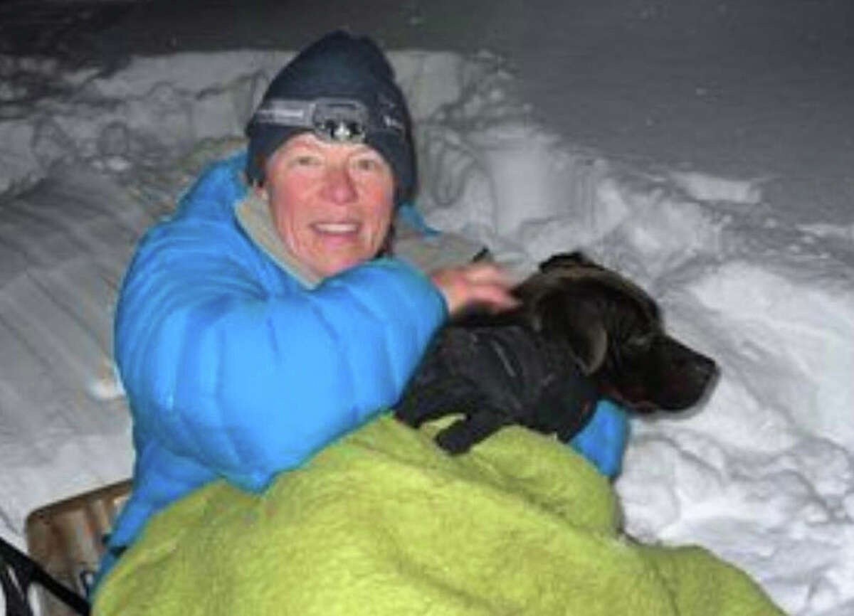 Tahoe PAWS and TLC 4 Furry Friends rescuer Leona Allen and Russ, the pit bull mix she helped rescue last month near Lake Tahoe, Calif.
