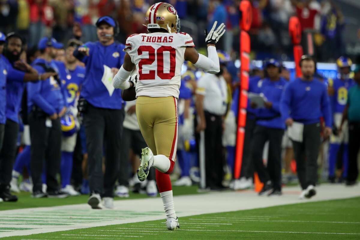 INGLEWOOD, CALIFORNIA - JANUARY 09: Ambry Thomas #20 of the San Francisco 49ers celebrates his game-ending interception in overtime against the Los Angeles Rams at SoFi Stadium on January 09, 2022 in Inglewood, California. (Photo by Katelyn Mulcahy/Getty Images)