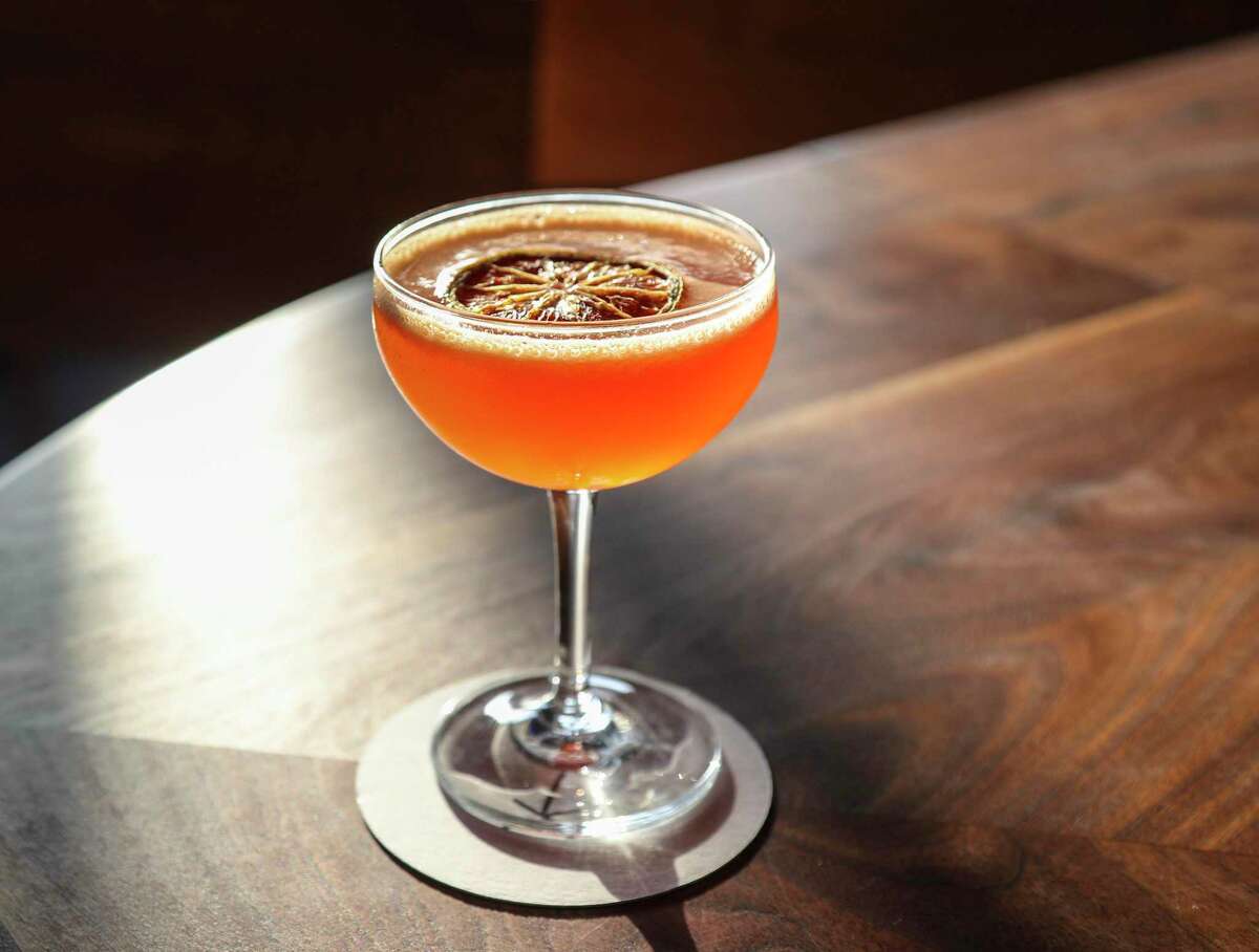 A “Clothed and Normal” a non-alcoholic cocktail, made with Giffard apertitif Sirop, seedlip citrus, lemon, orange jam, spices and sparkling water at Night Shift.