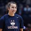 Connecticut's Caroline Ducharme (33) in before an NCAA college basketball game, Sunday, Jan. 9, 2022, in Storrs, Conn. (AP Photo/Jessica Hill)