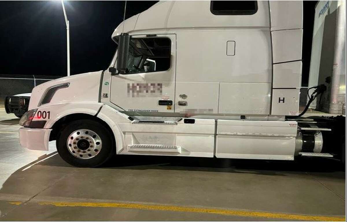U.S. Border Patrol agents said they discovered 24 migrants inside this white tractor-trailer. The driver was arrested on human smuggling charges.