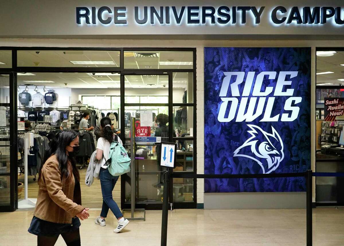 People stroll in the Rice Memorial Center at Rice University Thursday, April 1, 2021 in Houston. Rice University has announced an expansion of its student body and its campus. The physical expansion on the college’s 300 acres, will include a 12th residential college, a new engineering building, a building for the visual and dramatic arts, and a new student center that will largely replace the Rice Memorial Center.