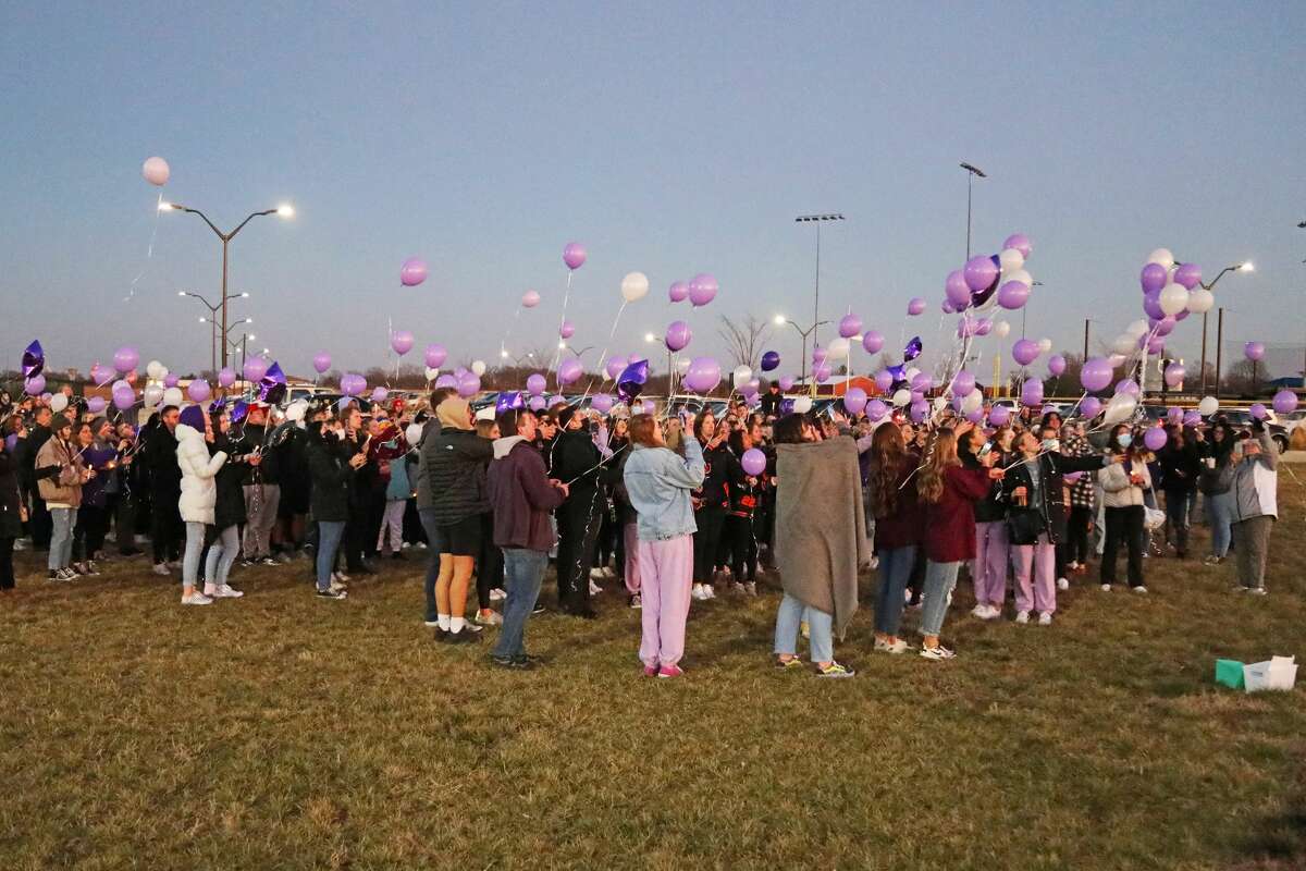 Family and a very large number of friends gather Monday to release balloons at Plummer Family Sports Park in Edwardsville. The ceremony honored 18-year-old Mackenzie Ann Allen who passed away Jan. 6. Daughter of Mark and Jill Allen, Mackenzie was a senior at Edwardsville High School and a member of the National Honor Society and Varsity Color Guard.