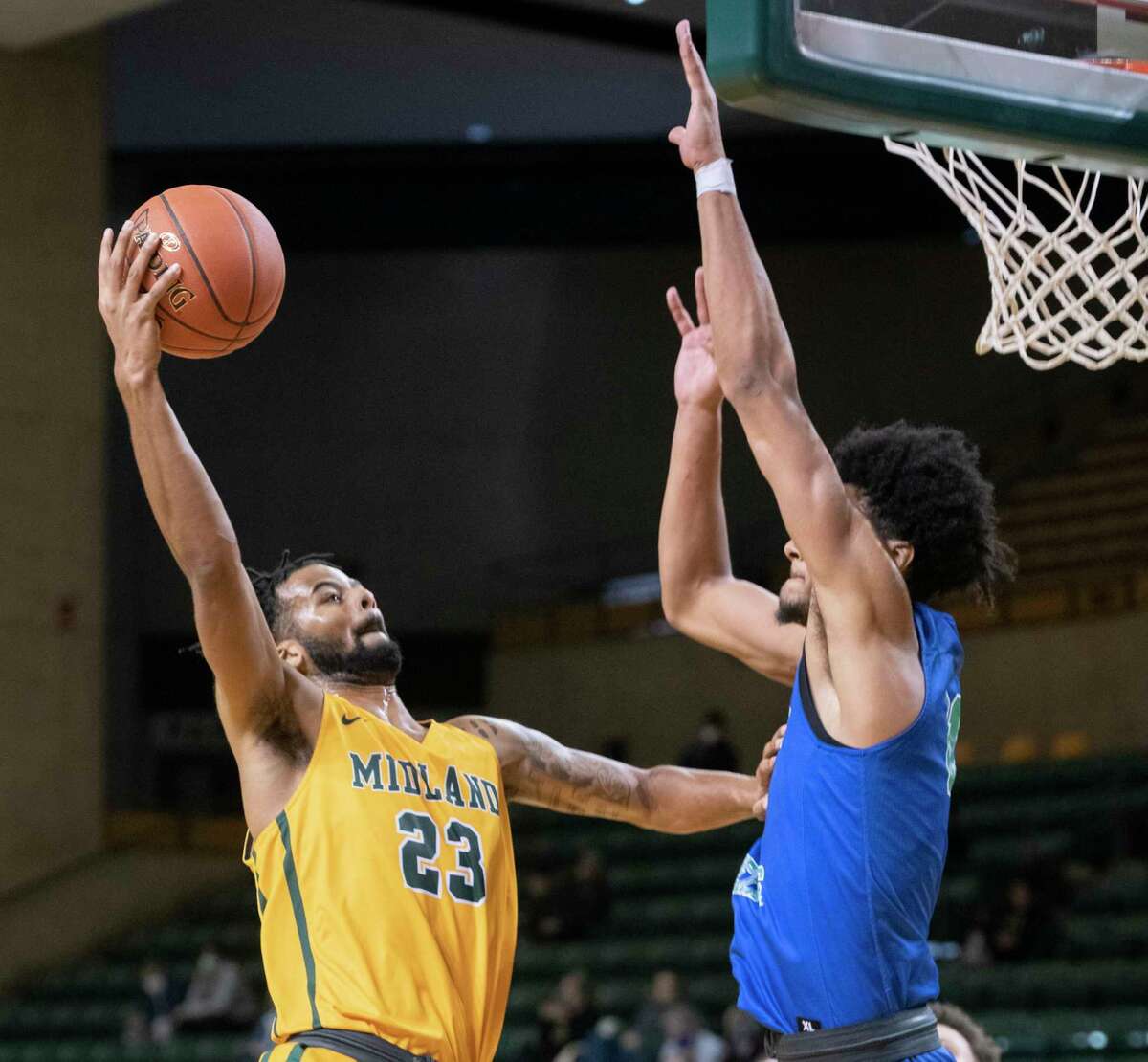 Midland College's Steven Richardson drives to the basket as Western Texas College's Tyson Brown defends 01/10/2022 at the Chaparral Center. Tim Fischer/Reporter-Telegram