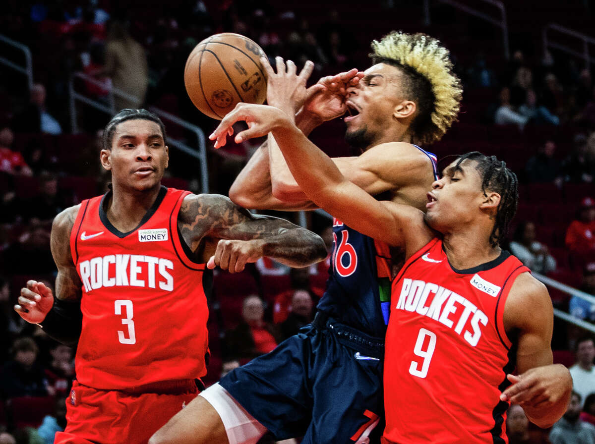 Houston Rockets guard Kevin Porter Jr. (3) flagrant fouls Philadelphia 76ers guard Charlie Brown Jr. (16) and gets removed from the game on the second half at the Toyota Center, Monday, Jan. 10, 2022, in Houston. Philadelphia 76ers won 111-91 against the Houston Rockets.