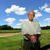 (Peter Hvizdak - New Haven Register) Walter "Bud" Smith, 90, has spent many decades building and managing his golf course, the Orange Hills Country Club on Racebrook Road in Orange, Thursday August 13, 2015.