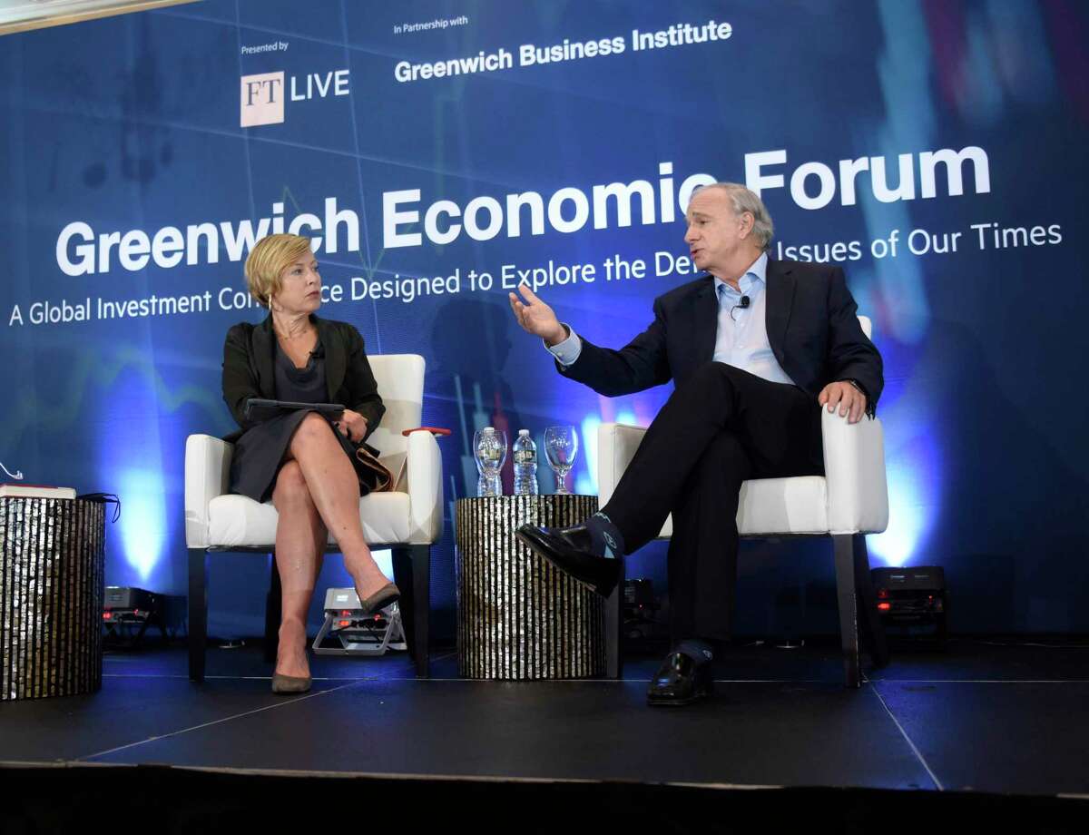 Bridgewater Associates founder Ray Dalio speaks with moderator Gillian Tett, editor-at-large of the Financial Times, at the Greenwich Economic Forum at the Delamar Greenwich hotel in Greenwich, Conn., on Tuesday, Sept. 21, 2021.