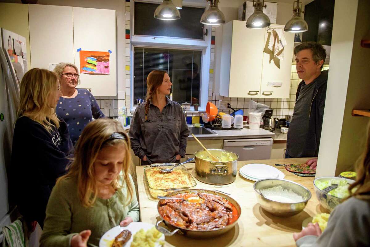 Pittsburgh restaurateur Trevett Hooper cooks a meal for his wife, Sarah, and their children.