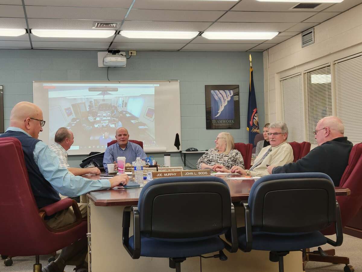 The Huron County Board of Commissioners talk during their meeting on Tuesday, where they discussed changes to a proposed public safety millage. The millage's scope was limited to cover only 911 services.