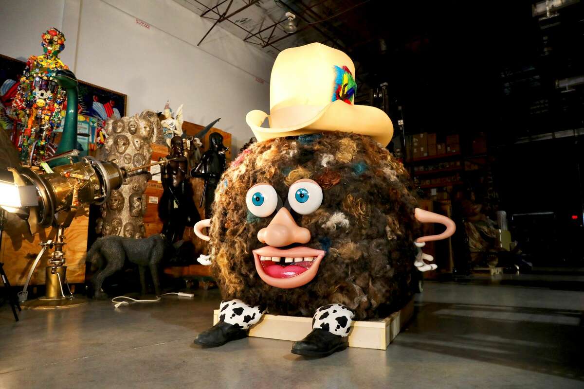 The giant ball of human hair decorated for New Year's celebrations. The ball of human hair set a new record coming in at 226 pounds.