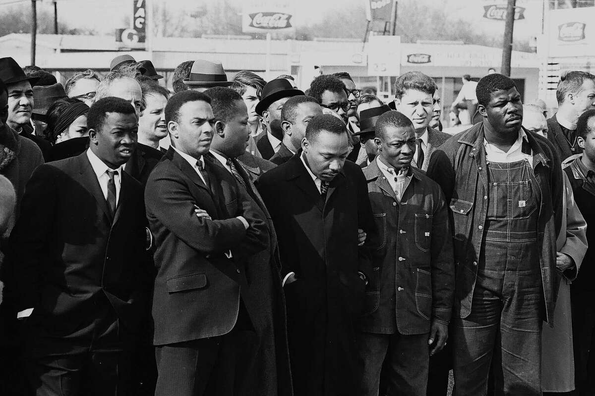 Martin Luther King, Jr., center, and others stand at the head of the group on Turn Back Tuesday in Selma, Ala., in 1965.