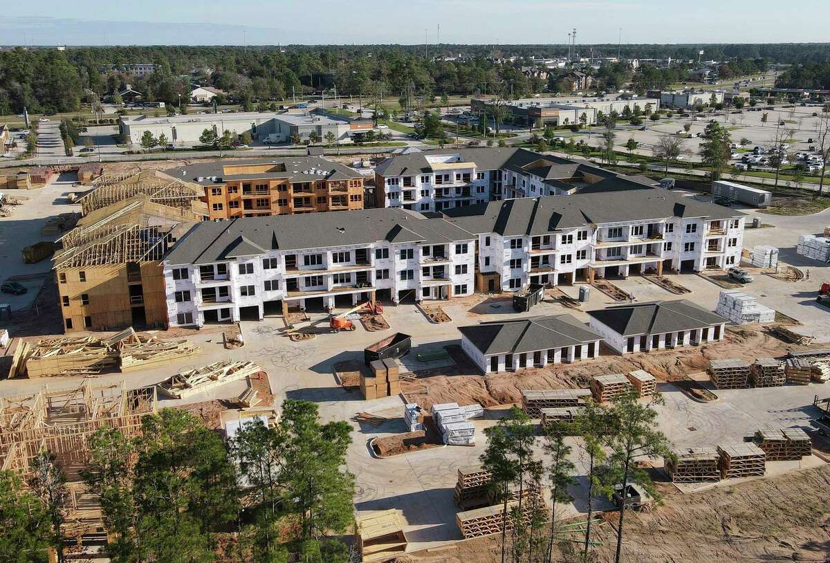 Construction continues on homes in The Woodlands Hills master planned community, Thursday, Dec. 23, 2021, in Willis.